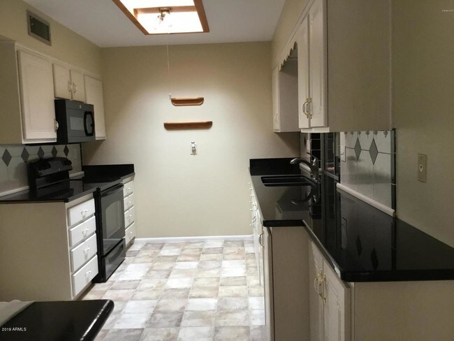 Foto del edificio - 10313 W Desert Rock Dr