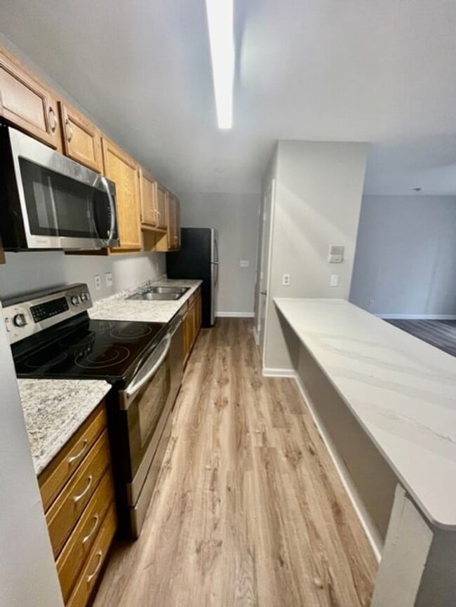 Building Photo - Must see this adorable 2 Bedroom, 2 bath condo on the 2nd floor in the RoseCroft community