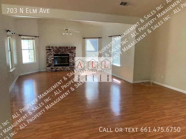 Building Photo - 703 N Elm Ave