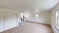 This well-appointed one-bedroom, one-bathroom unit at 150 E Atlantic Ave in Hi-Nella, NJ offers a thoughtfully laid-out single-floor living space. The open living and dining area is finished with soft neutral carpet and features baseboard heating, a ceiling fan, and multiple windows that invite natural light and views of the surrounding neighborhood. A closet with sliding mirrored doors adds convenience to the living area.

The kitchen is a standout feature, showcasing crisp white shaker-style cabinetry, striking marble-look countertops, a stainless steel sink, gas range, and built-in microwave, all complemented by durable wood-look flooring and a window overlooking the outdoors.

The bedroom is a comfortable, carpeted retreat with a mirrored sliding-door closet and ample wall space. Additional storage is provided by four closets throughout the unit, offering generous organizational options.

The bathroom is elegantly finished with a full-size soaking tub and shower enclosure surrounded by bold marble-patterned wall panels, paired with a bright window for natural ventilation. Throughout the unit, a clean, neutral color palette and updated finishes create a fresh, move-in-ready atmosphere ideal for comfortable everyday living.