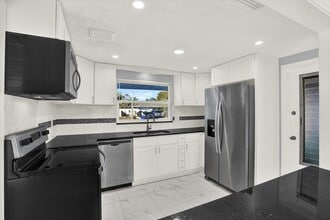 Building Photo - 7902 Canna Dr