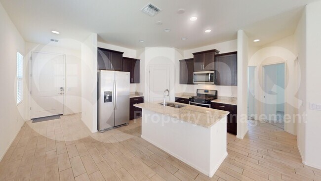 Building Photo - 7005 W Inkwood Ln