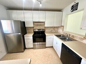Building Photo - 9431 Boca Cove Cir