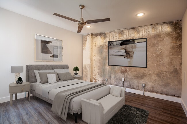 Spacious bedroom easily fits your king bed. - 722 E McMillan St