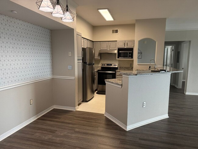 Building Photo - $1975 | 3-Bedroom 2-Bath Condo | Fully Ren...