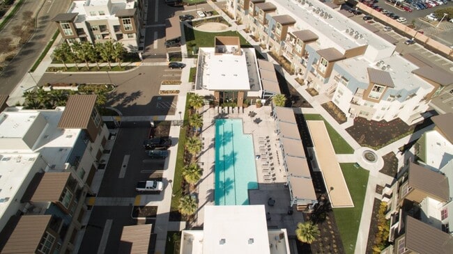 An aerial view of Aspire Apartments in Tracy California, Luxury living with a swimming pool. - Aspire Apartments