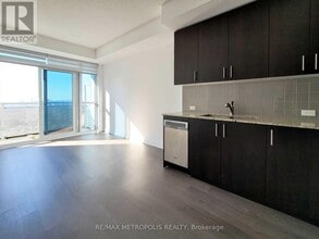 Building Photo - 255 Village Green Square