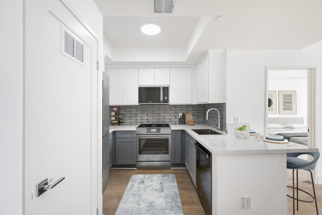 Building Photo - Experience Bright and Modern Westside Livi...