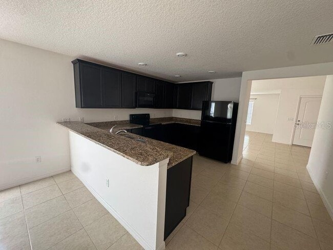 Building Photo - 6909 Crested Orchid Dr