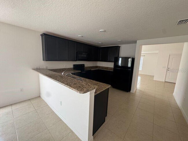 Foto del edificio - 6909 Crested Orchid Dr