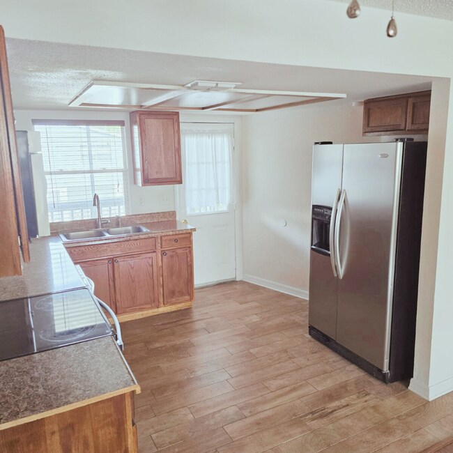 Kitchen leading to outside patio - 7030 Oelsner St