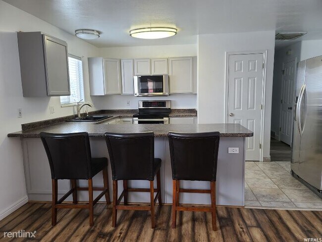 Foto del edificio - 4 br, 2 bath House - 6883 S 3220 W