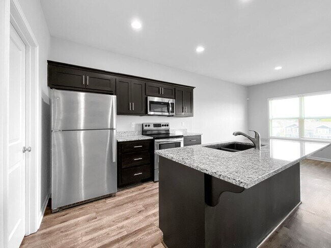 Building Photo - Spacious 4-Bed, 3-Bath Home with Finished Basement in Raymore, MO – Move-In Ready!