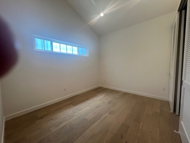 Bedroom- engineered hardwood - 2725 Barry Ave