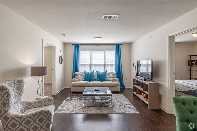 2 habitaciones, 2 baños, 875 pies cuadrados, sala de estar - Glenrock Apartments