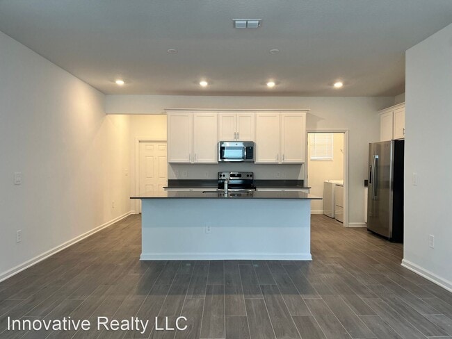Building Photo - 3 br, 2.5 bath House - 2437 Relaxing Lane