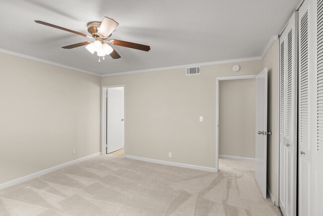 Large Duplex Primary Bedroom - Sycamore Green Apartments