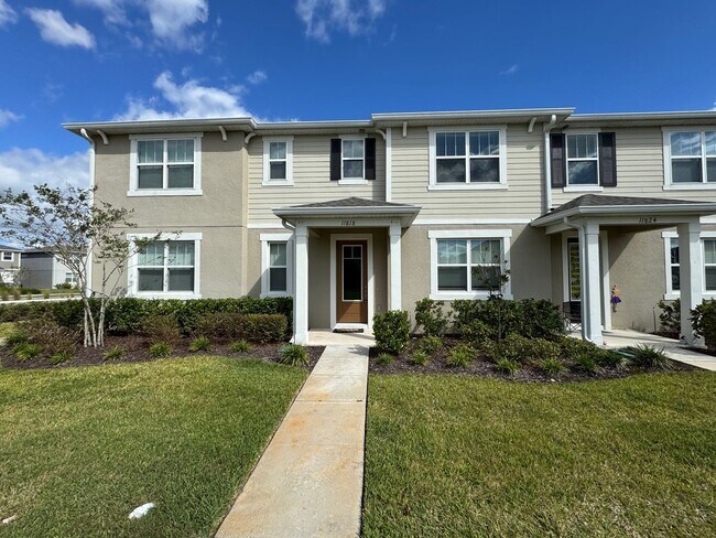 Building Photo - $300 OFF OF A MONTH OF RENT!! INTERNET INCLUDED! Modern 3 Bedroom, 2 Bathroom Townhome in Prime L...