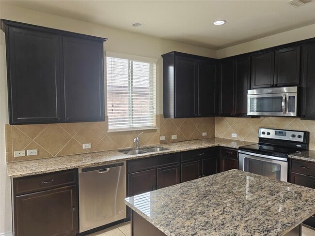 Building Photo - 5610 Hopkins Dr