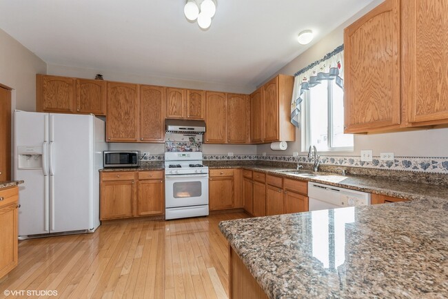 Foto del edificio - 6518 Glacier Ridge Dr