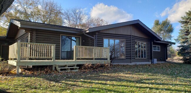Building Photo - Log Cabin - Spacious 3 bedroom 2.5 bath Home