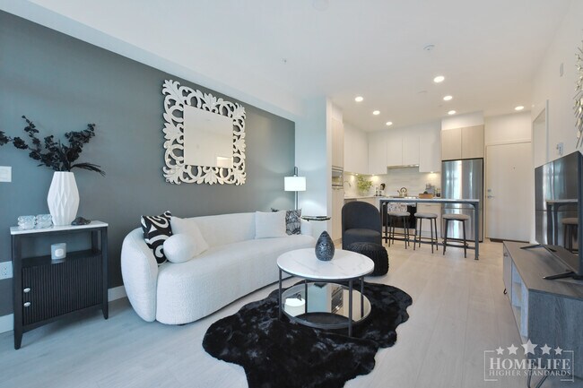 Photo du bâtiment - Fully Furnished 1 Bedroom Condo at Salt & Meadow — Walk-Out Backyard, Water Views & Resort-Style ...