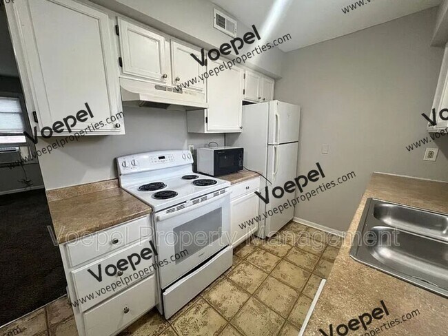 Foto del edificio - 8738 East Thompson Avenue