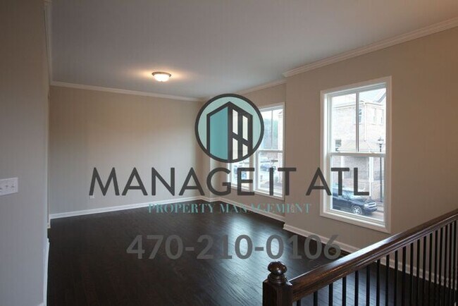 Foto del edificio - A gorgeous townhouse in the Suwanee Walk n...