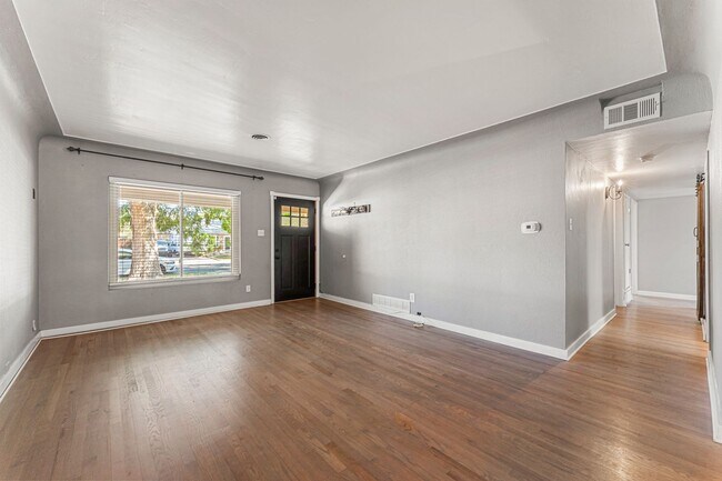 Building Photo - Charming Home with Open Floor Plan, wood f...