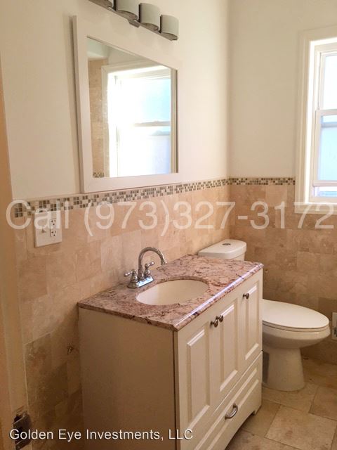 Foto del edificio - 115-117 Renner Ave