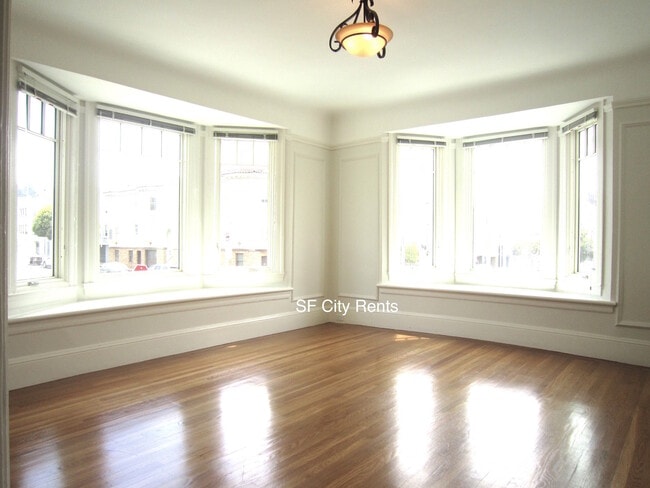 Building Photo - Marina: Renovated Corner Condo w/ Formal D...
