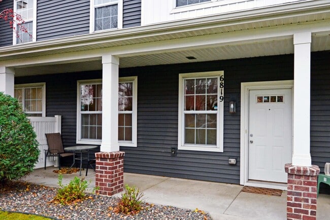 Building Photo - 6819 Narcissus Ln N