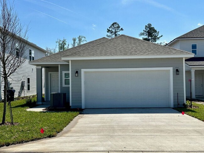 Building Photo - New 3 bed/2 bath located in the desired Tr...