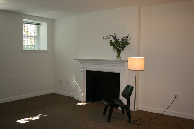 Living Room area with historic mantel and details - 2935 N Charles St