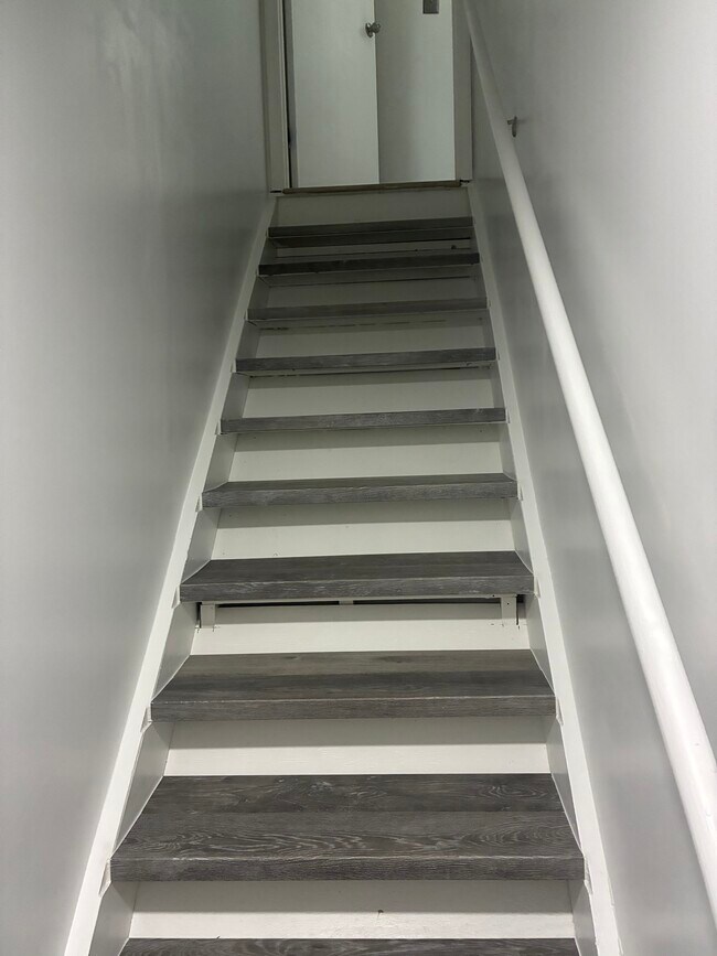 Stairs to main floor - 14433 Twig Rd