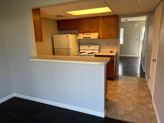 View from Dining Room to Kitchen and Front Room - 719 E Spruce St