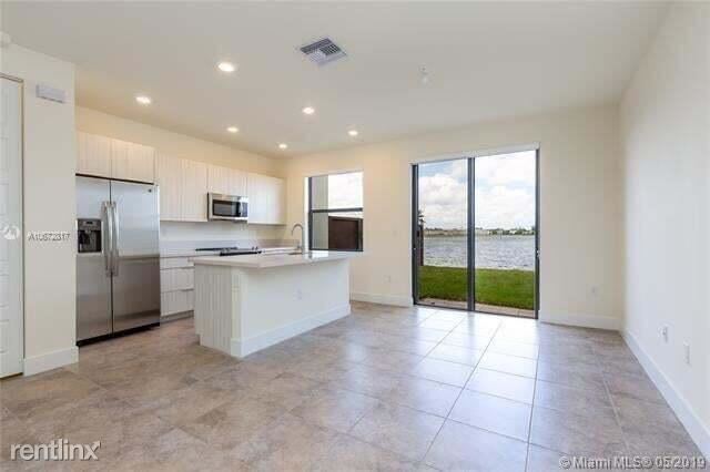 Building Photo - 3 br, 2.5 bath House - 15857 NW 90th Ct