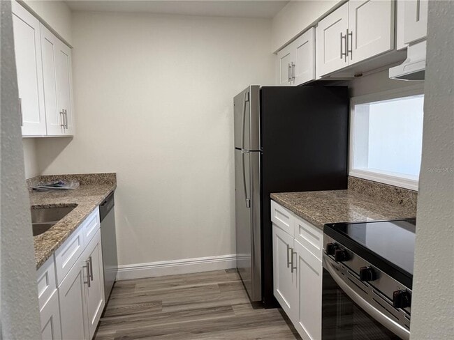 Building Photo - 9209 Tudor Dr