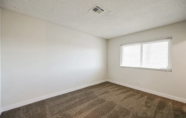 First bedroom - 130 Bel Port Dr