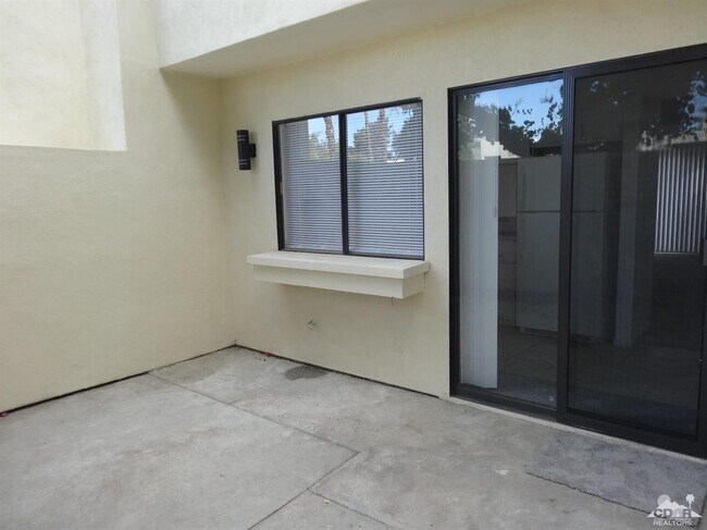 Building Photo - 48952 Desert Flower Dr