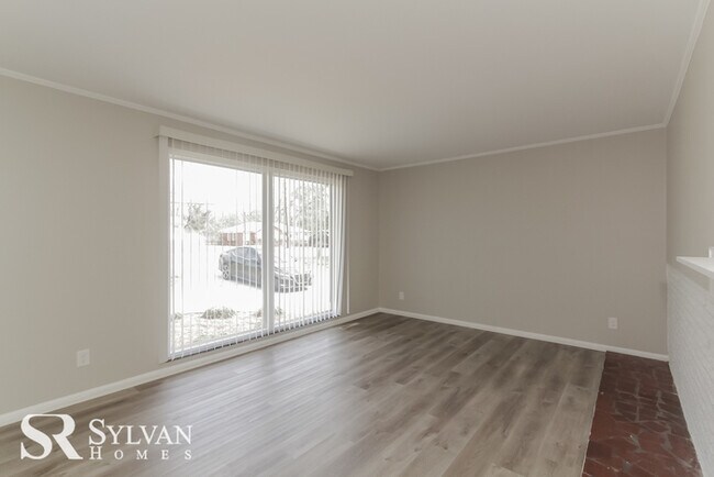 Building Photo - You will love this charming brick home
