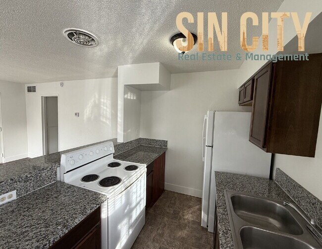 Foto del edificio - Discover Urban Comfort: Spacious 1-Bedroom Oasis at Lyn Capri