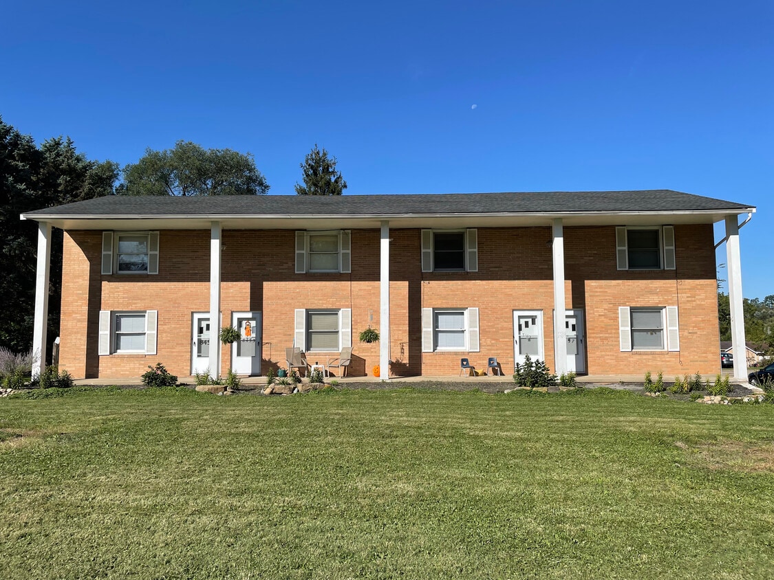 Front of Building, far left unit available - 8451 Pleasantwood Ave NW