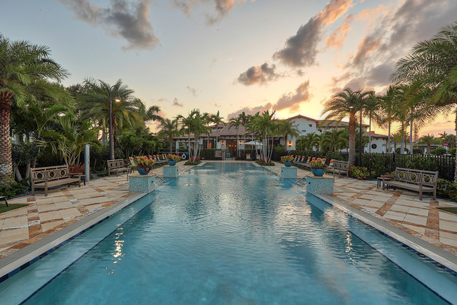 The beach entry resort style swimming pool is the perfect spot to cool down. - Windsor at Delray Beach