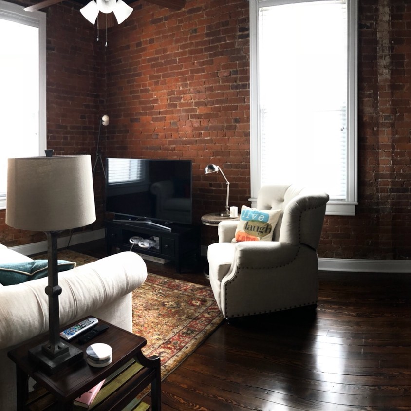 Exposed brick walls - 119 E Columbia St