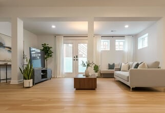 pacious multi-purpose room with fireplace and French doors (2025 addition) - 6471 Grommet Dr