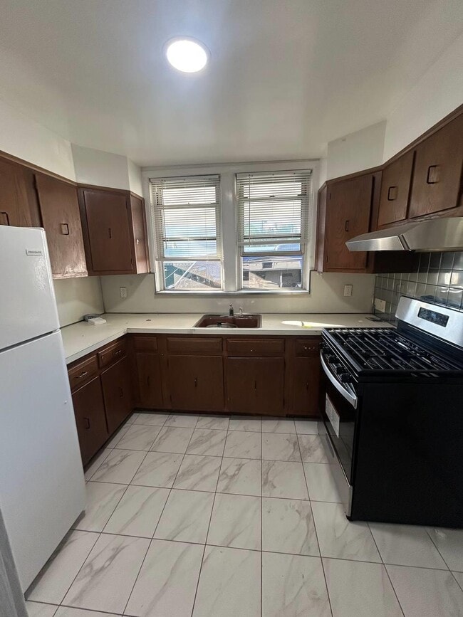 Building Photo - 3175 Layton Ave