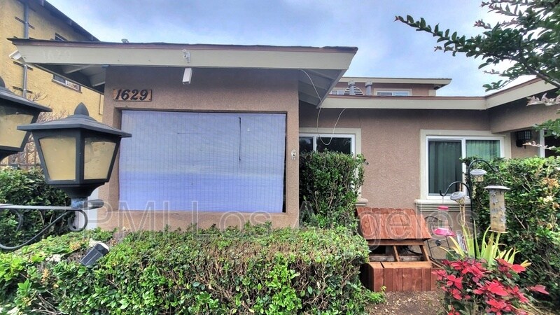 Foto principal - 1629 E Vernon Ave