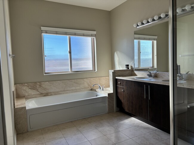 Penthouse mustard bathroom - Holt Townhomes