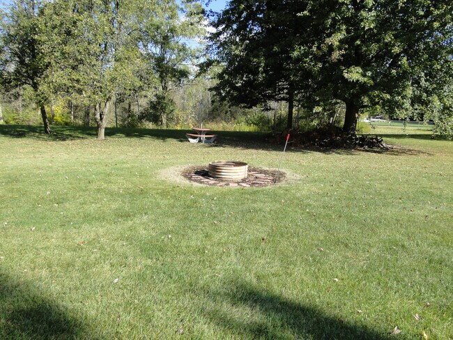 Building Photo - WELCOMING TRI-LEVEL HOME ON OVER AN ACRE O...